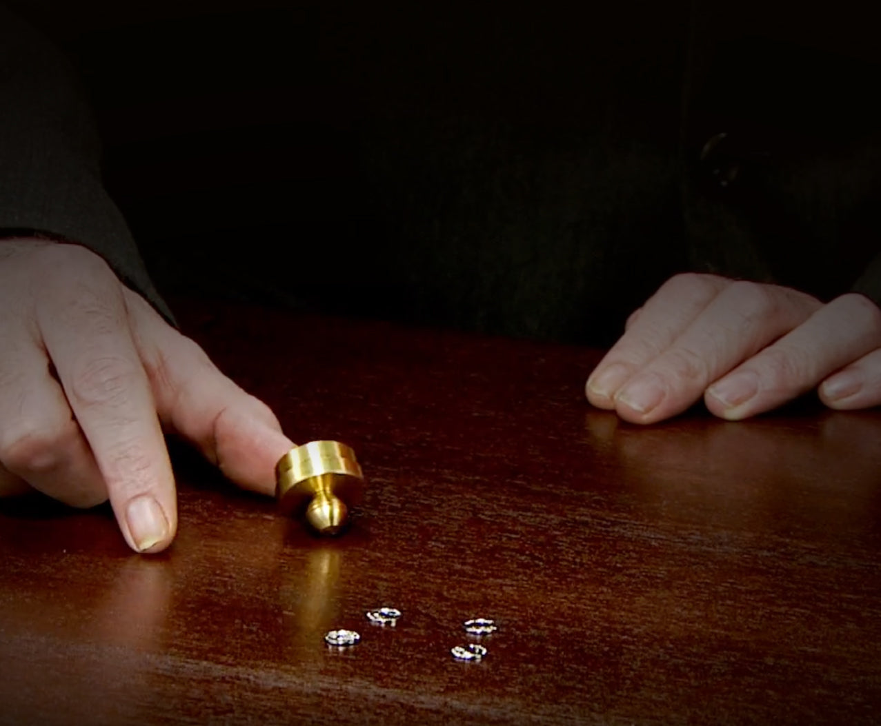 Shrinking Nickels Magic Trick
